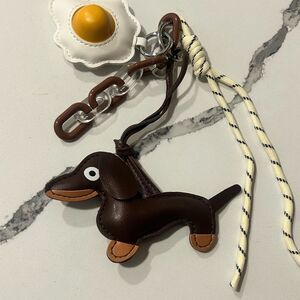 Brown Dachshund Keychain with Egg Charm
Faux leather